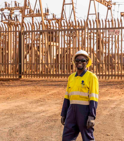 electrical worker stands in front of site